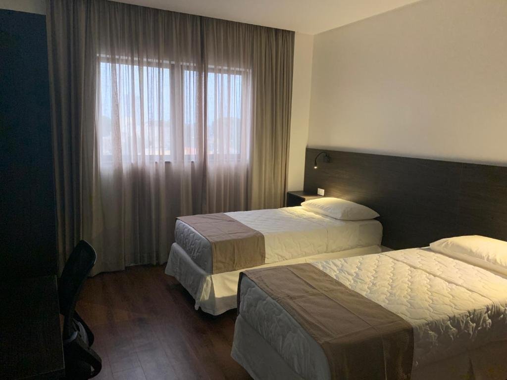Quarto Duplo